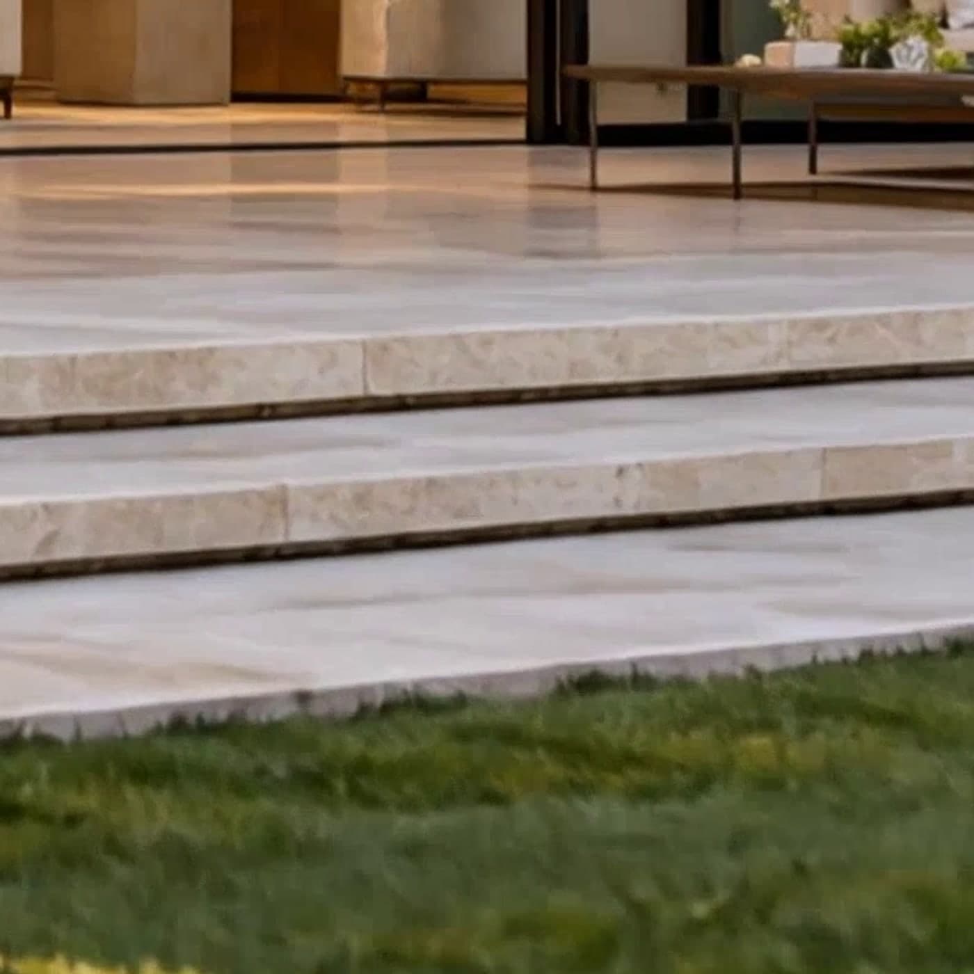 Honed travertine steps in low sun
