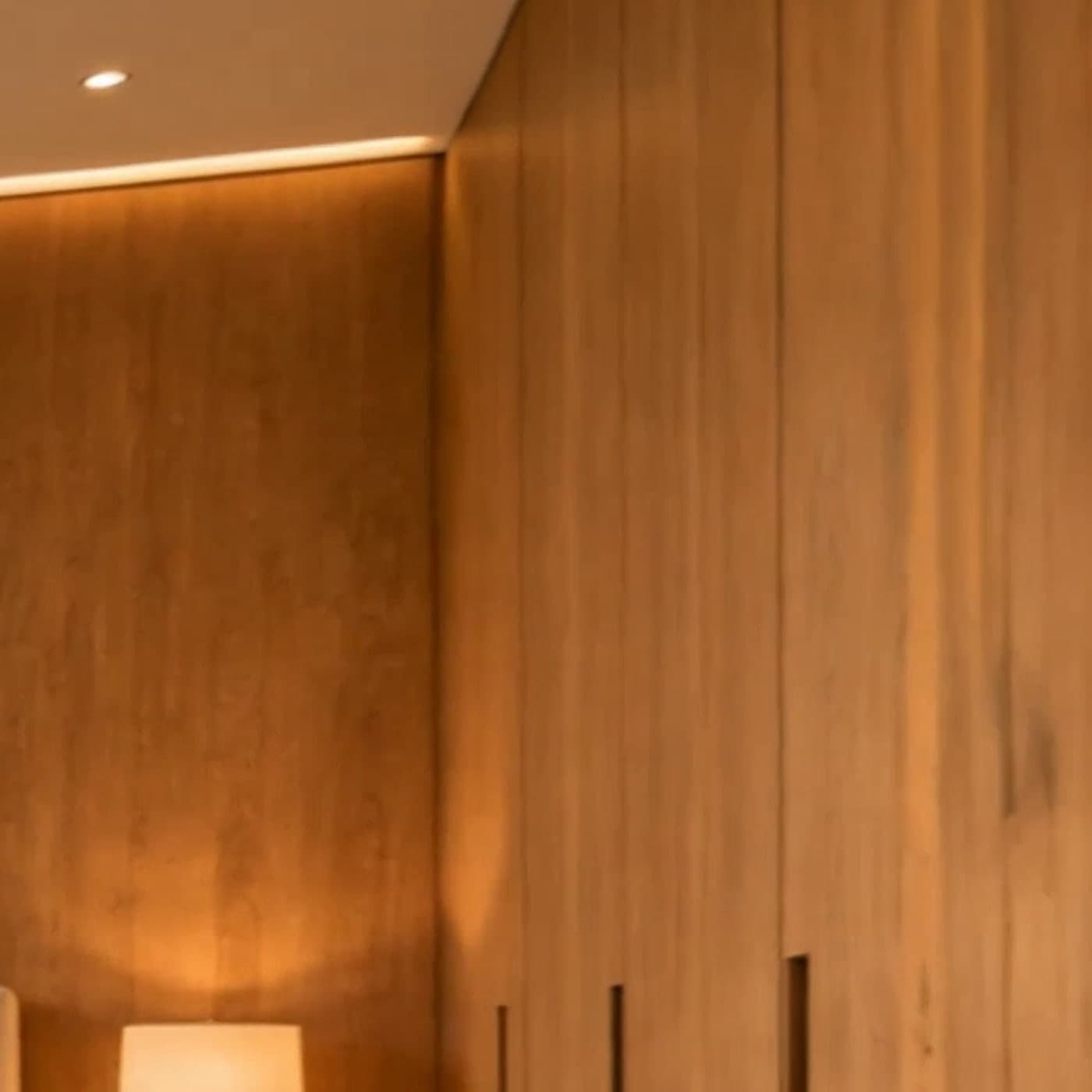 Walnut panelling lit from above